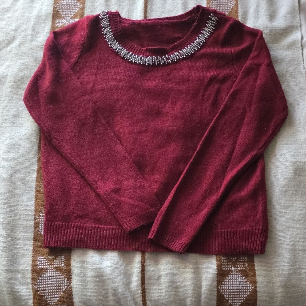 Elegant Red Sweater with Beaded Neckline